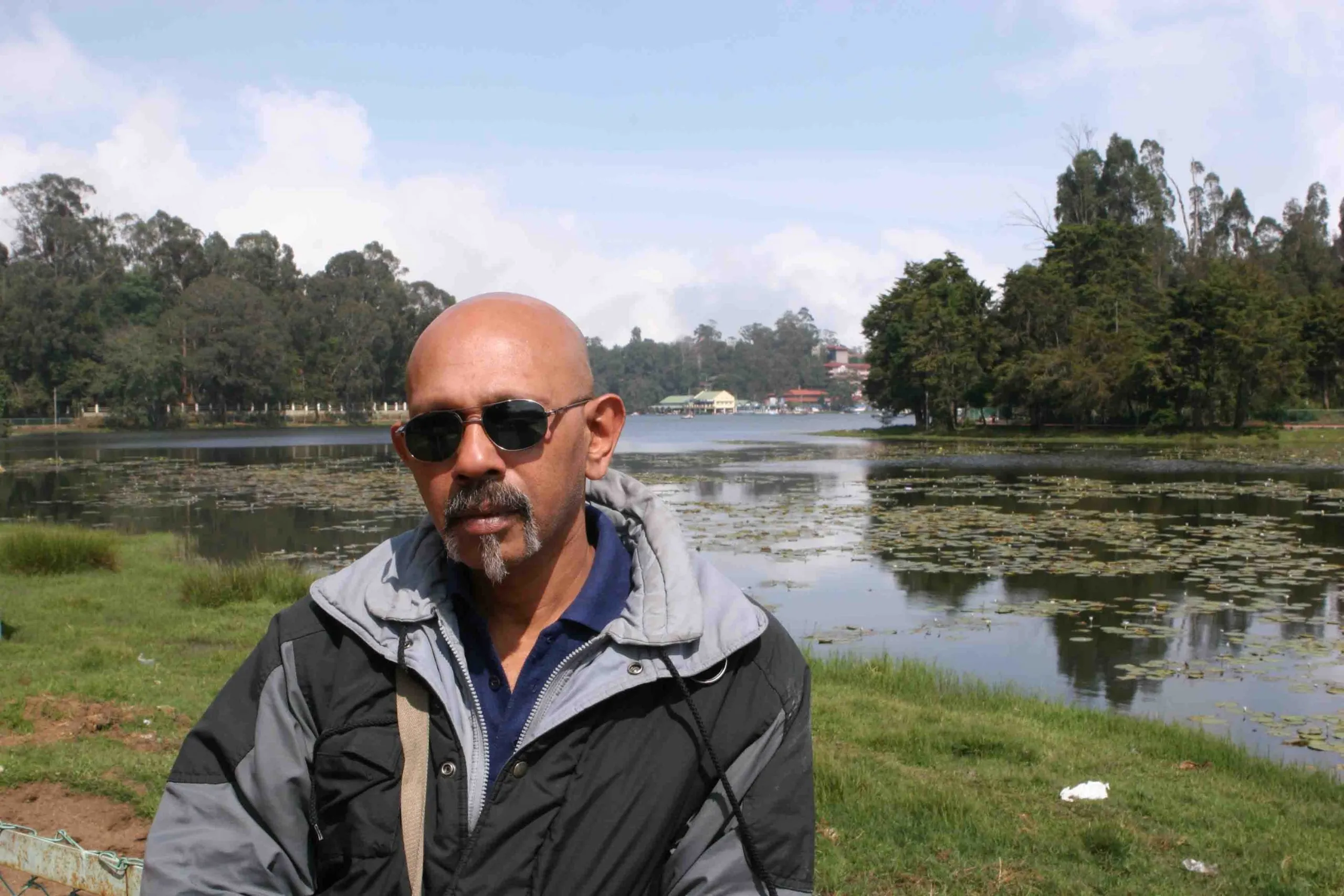Dheena Chandra Dhas beside Kodaikanal lake, the hill station in Tamil Nadu where he records
